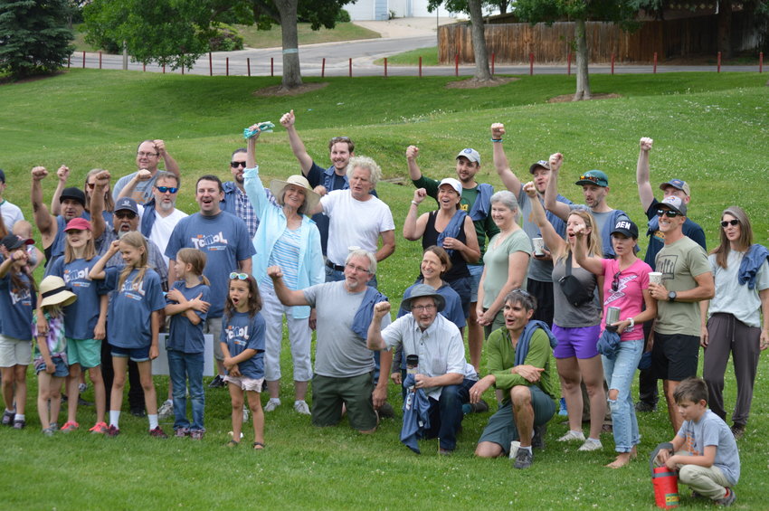 About 50 volunteers cheered, "I'm a tool," at the start of Englewood's Day of Service event on June 18, 2022. The volunteers first met at Rotolo Park before dispersing to their assigned volunteer projects.